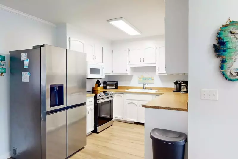 Enjoy using a new refrigerator and stove while staying at Sea Turtle's Nest!