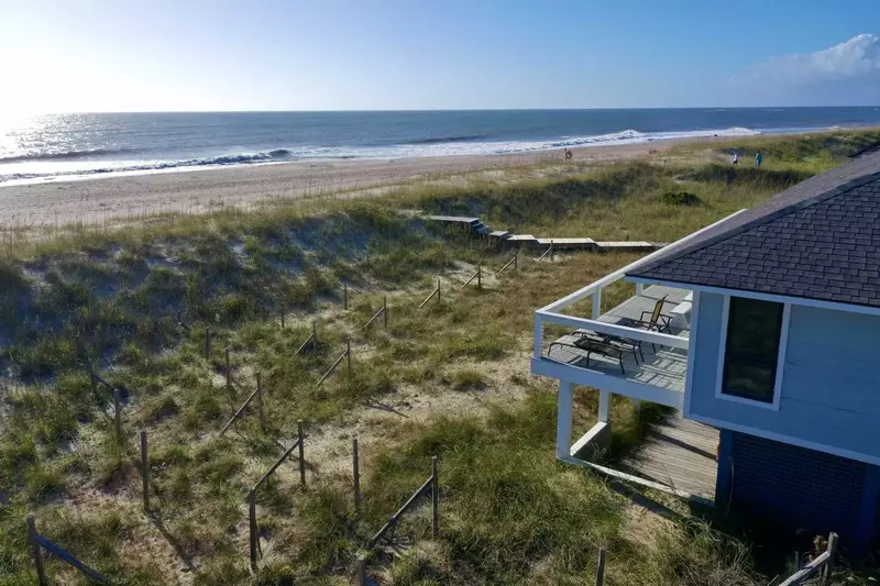 Huge deck with ocean views, private beach access, plenty of beach toys and chairs, Summer Wind is a perfect BHI Vacation