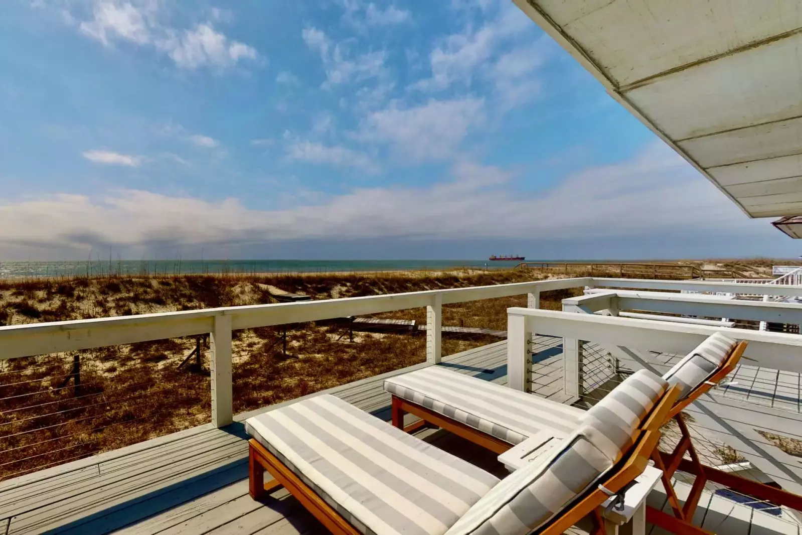 Watch the wildlife and the ships pass through the Cape Fear Channel