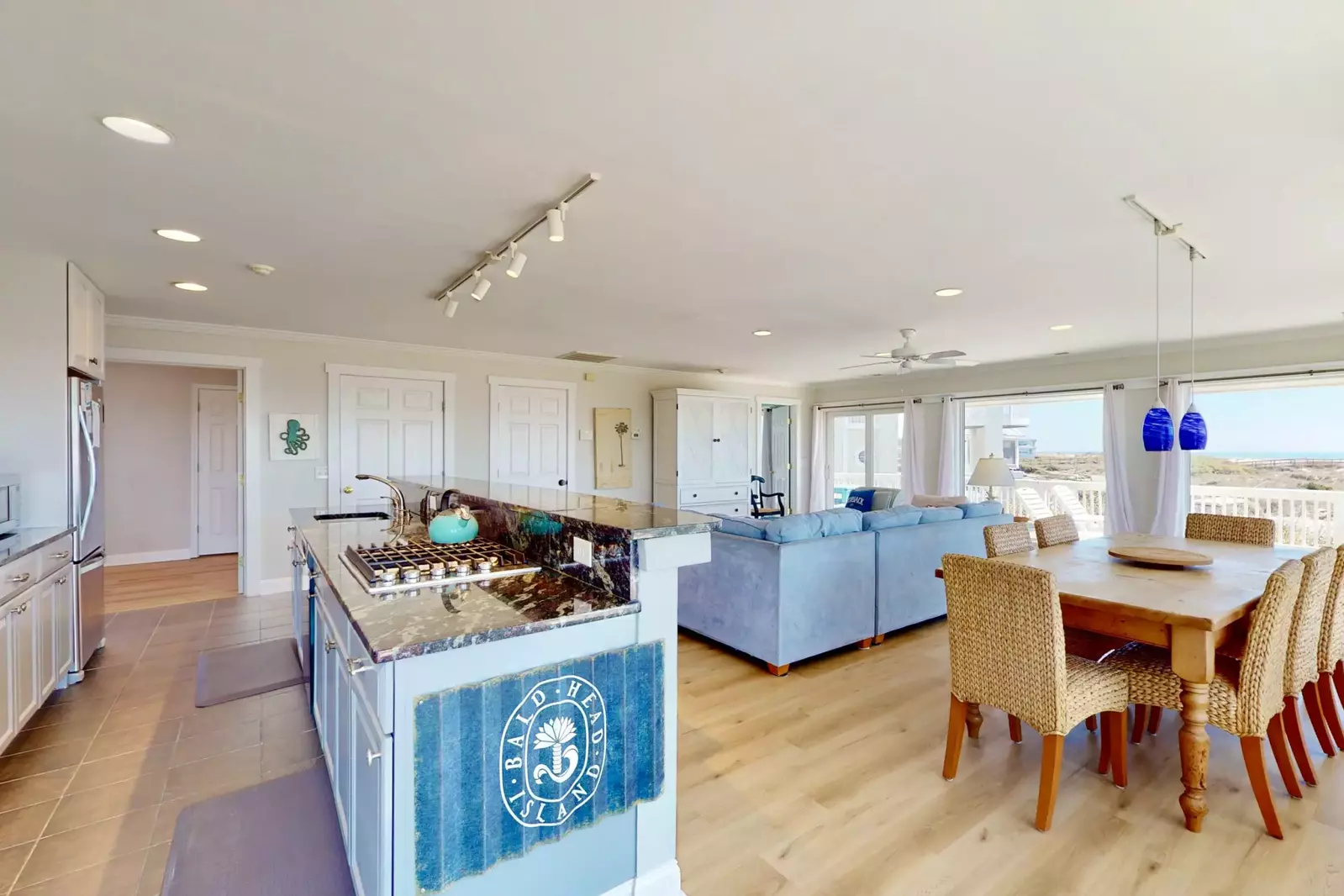 Open concept kitchen, dining and living room