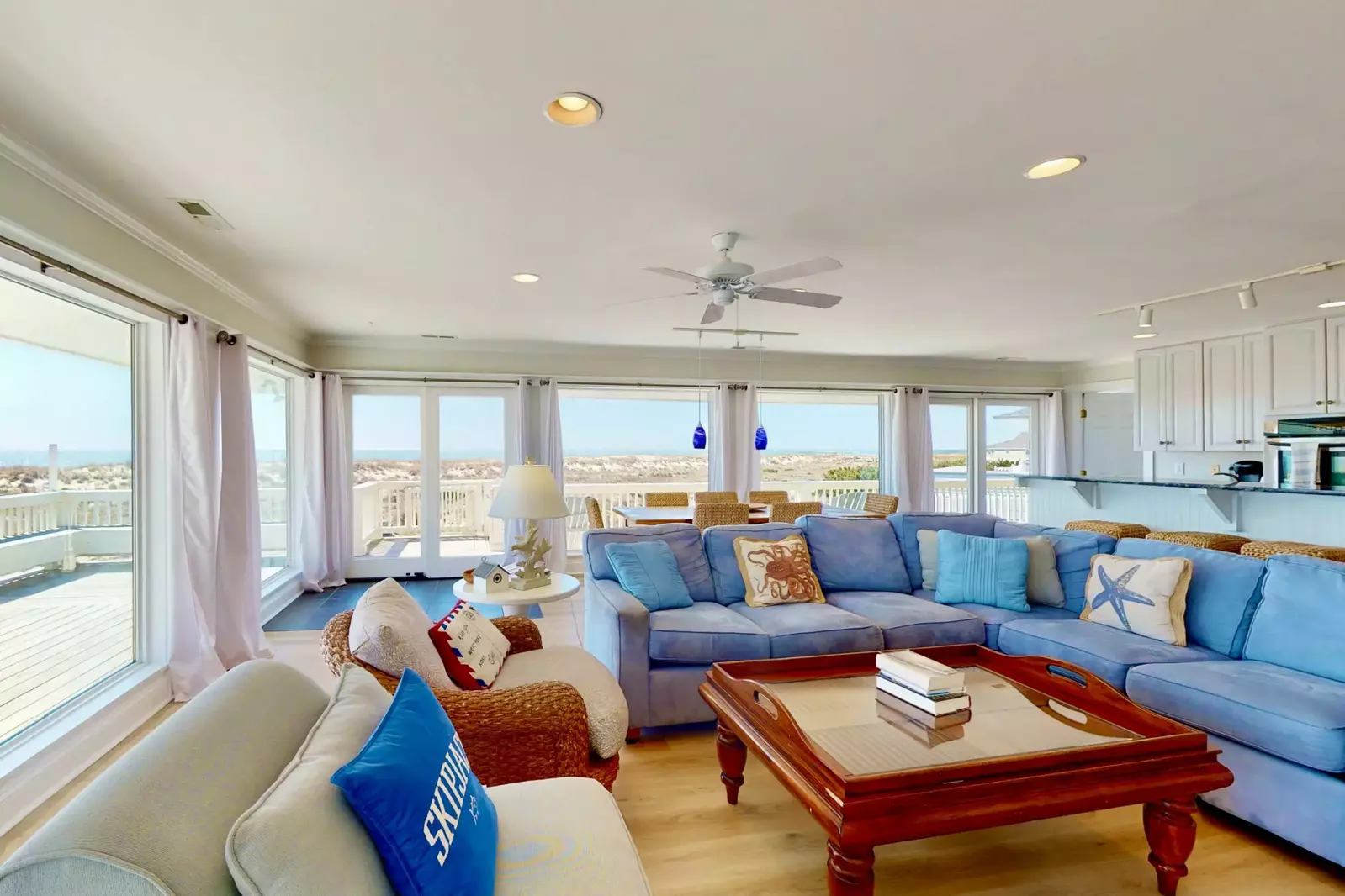 There is plenty of comfortable seating and natural light in the living room