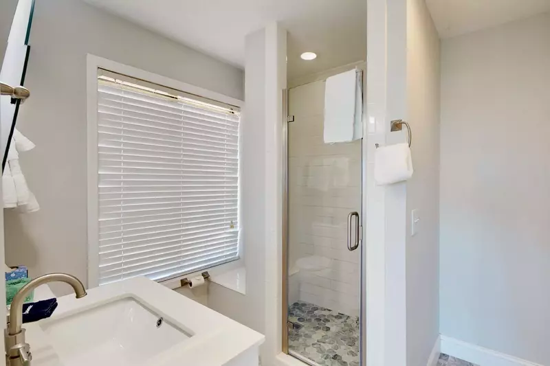 Enjoy the tiled flooring in this walk in shower