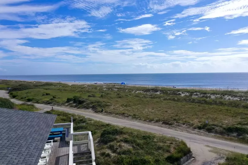 There are 2 beach access points, each just few hundred feet from Washashore