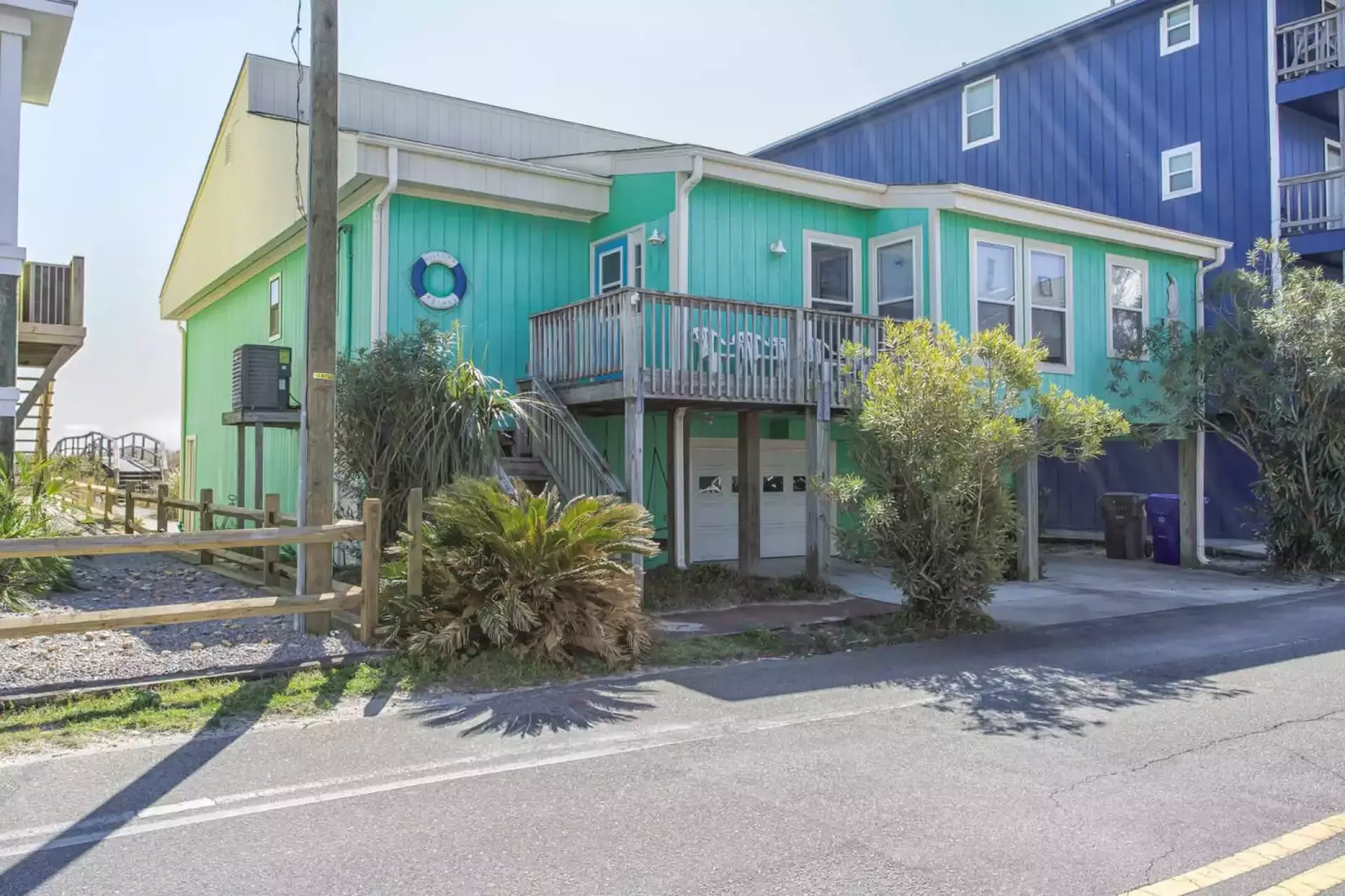 True oceanfront home! See the dock!!! Why stay in a condo when you can have your own place with a private dock