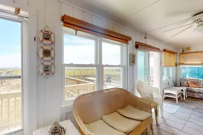 Ocean views from the many windows in the sunroom at Miller's Whimsey