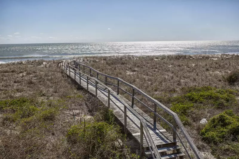 About 100 steps to the beach on your own private boardwalk