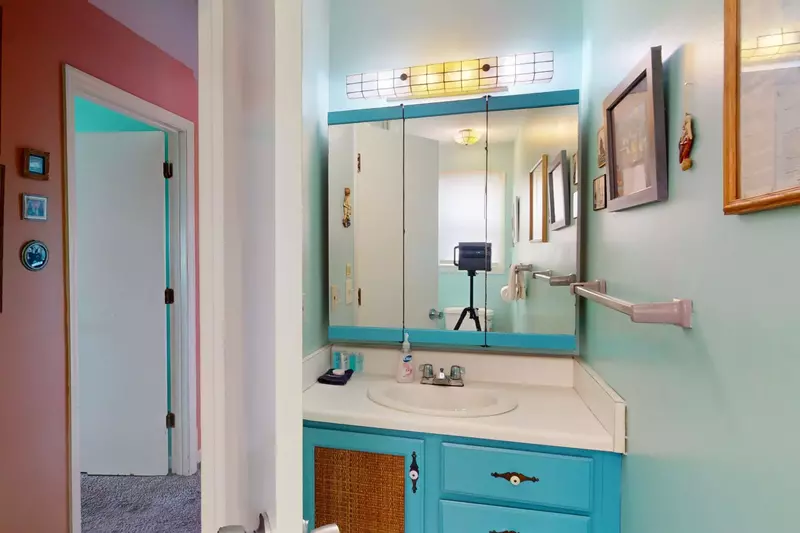 Hallway bathroom with shower