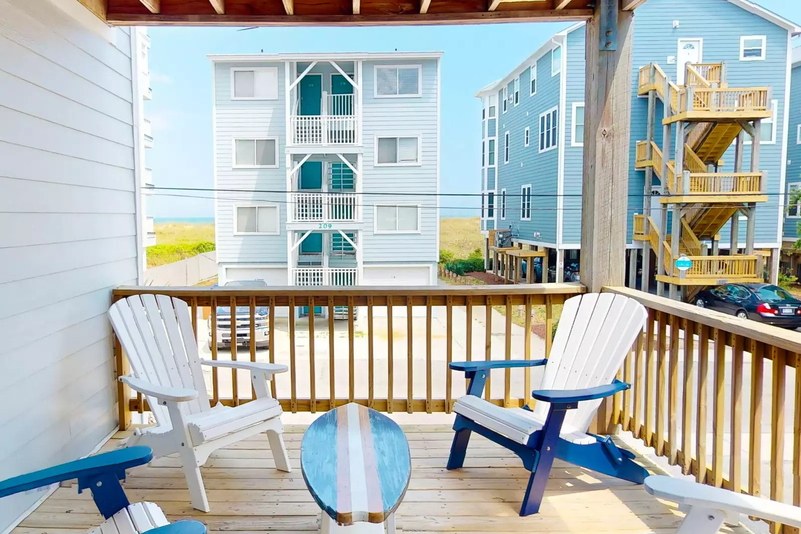 Relax with ocean views, outdoor seating and a fun surfboard table!