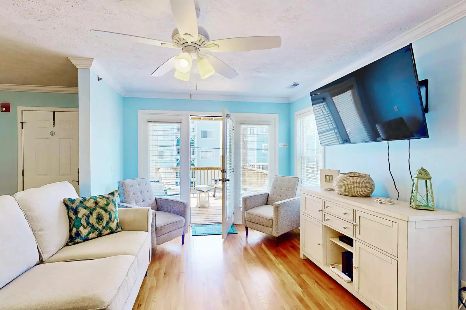 Relax and watch the flatscreen after a day at the beach.