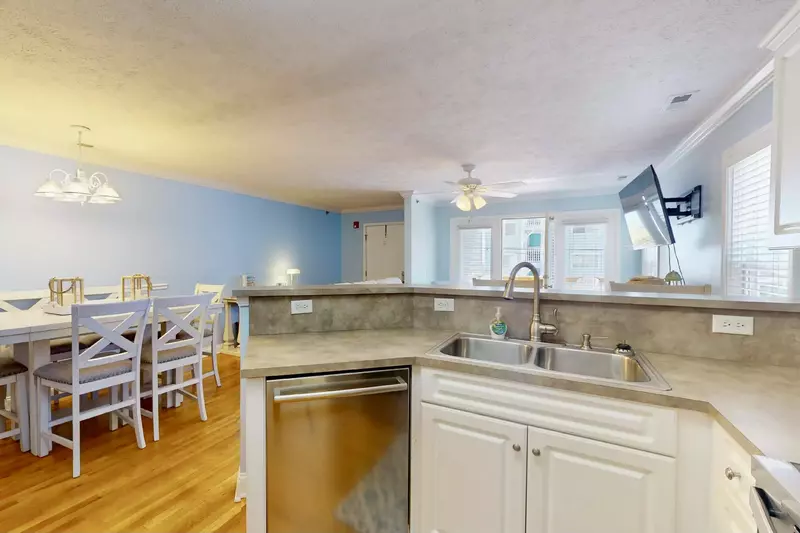 The kitchen is open to the dining and living rooms to allow conversations while cooking!