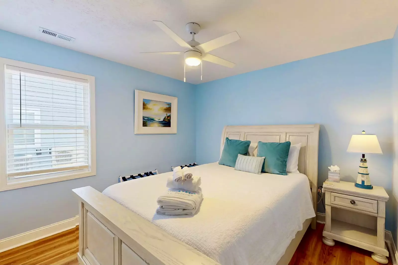 The second bedroom has a queen bed and a large closet.