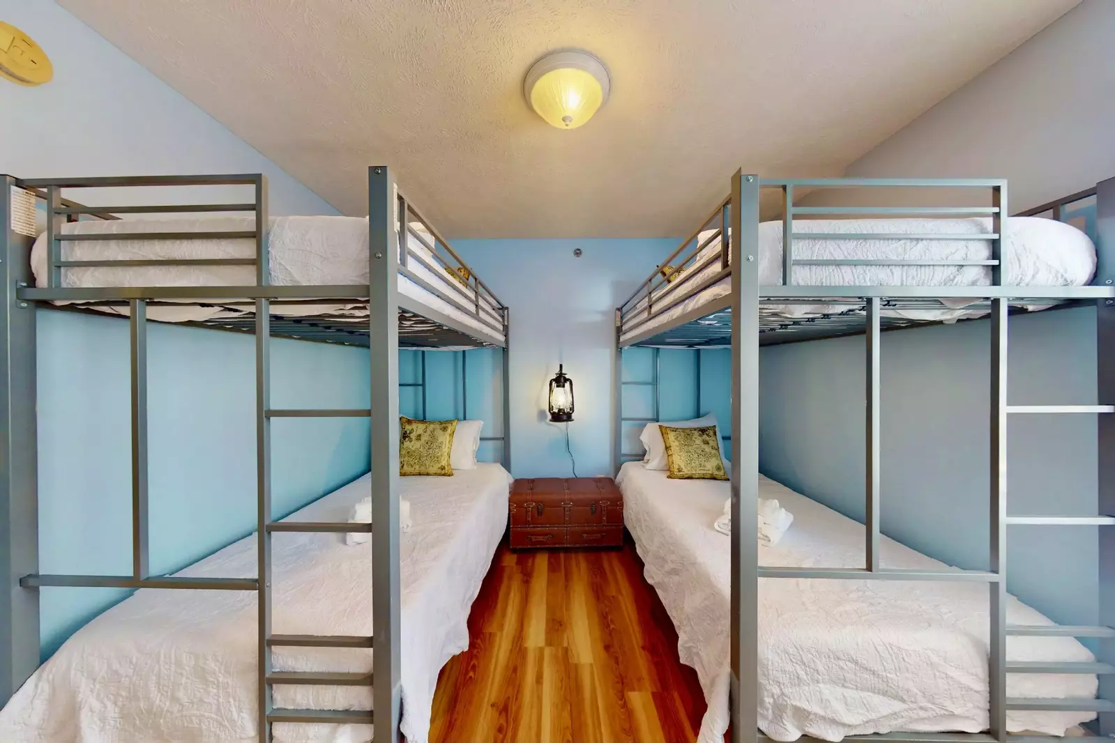 This cute bunk room sleeps 4