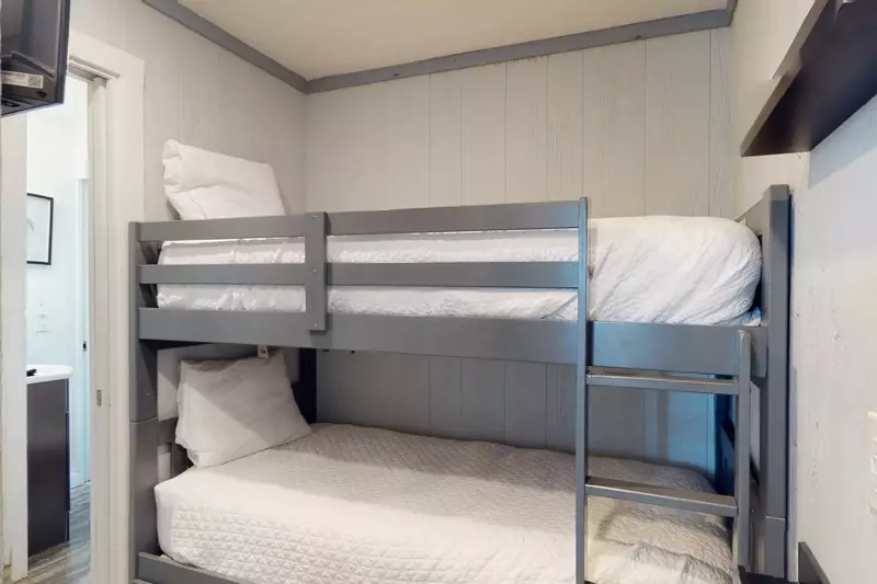 Bunk room with direct access to full bathroom