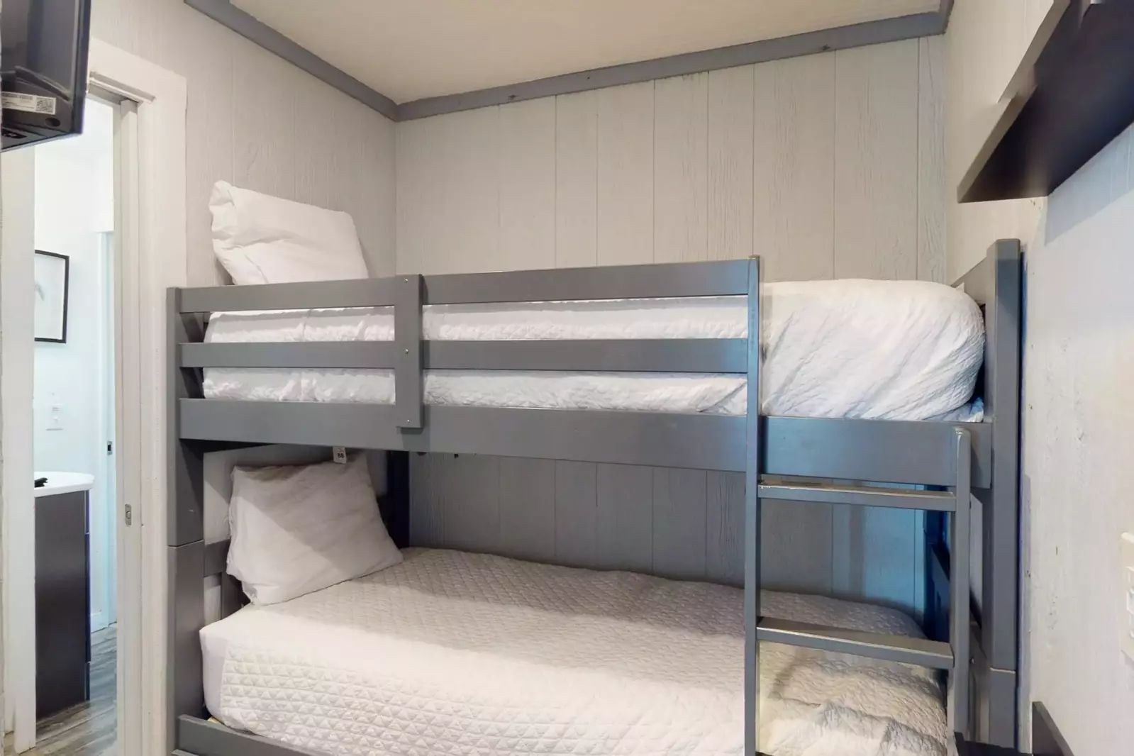 Bunk room with direct access to full bathroom
