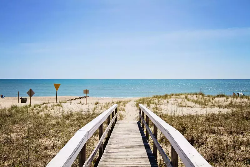 Steps away from the beach! Walk down the private dock and feel the sand between your toes.