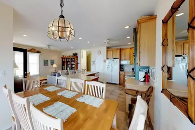 The dining table has plenty of space for the whole crew at dinner time.