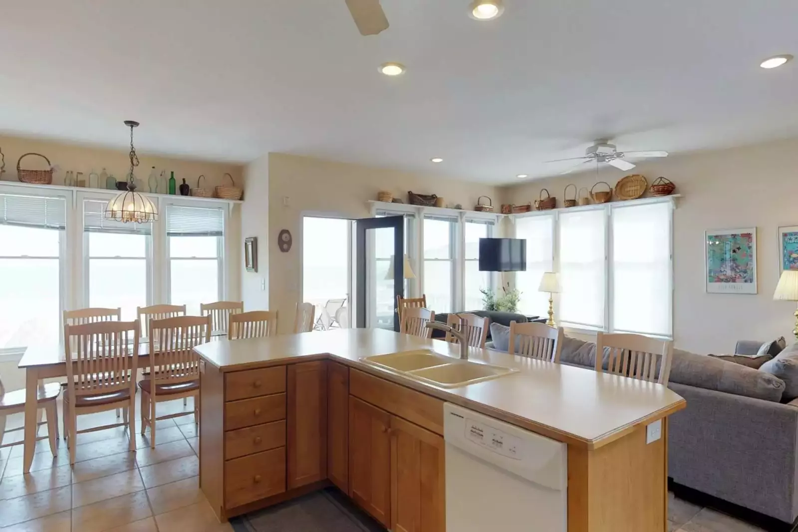 Open concept kitchen and island has the room for the entire group