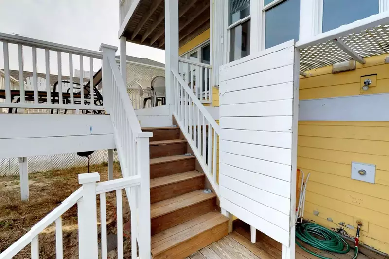 Access to beach from main deck.  Outdoor shower with area to hose down beach bodies and amenities