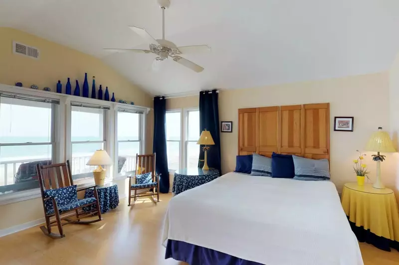 spacious owners suite with king bed