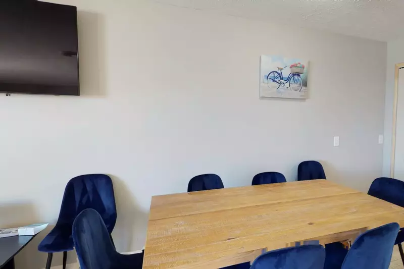 The dinning table has enough room for the entire group