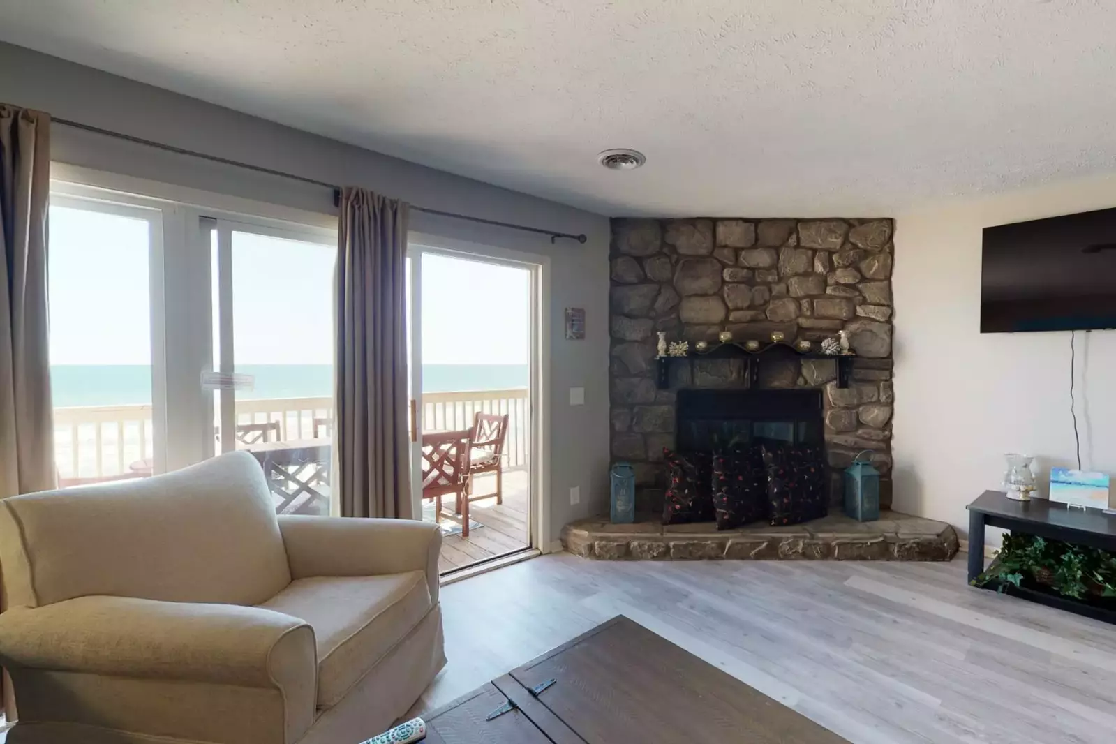 Watch the big game from the comfy couch, while listening to the calming waves.