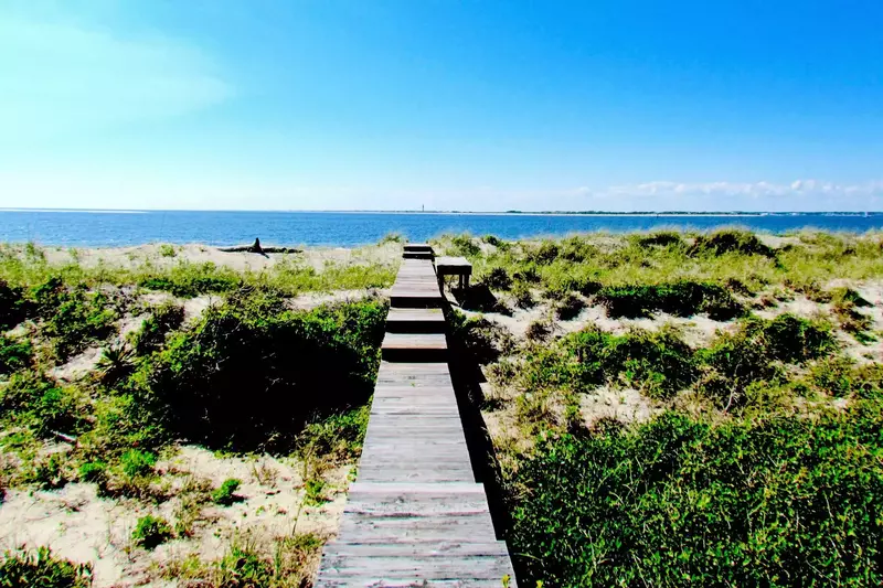 Less than 100 yards your feet are in the sand.  Ocean Front, You betcha!