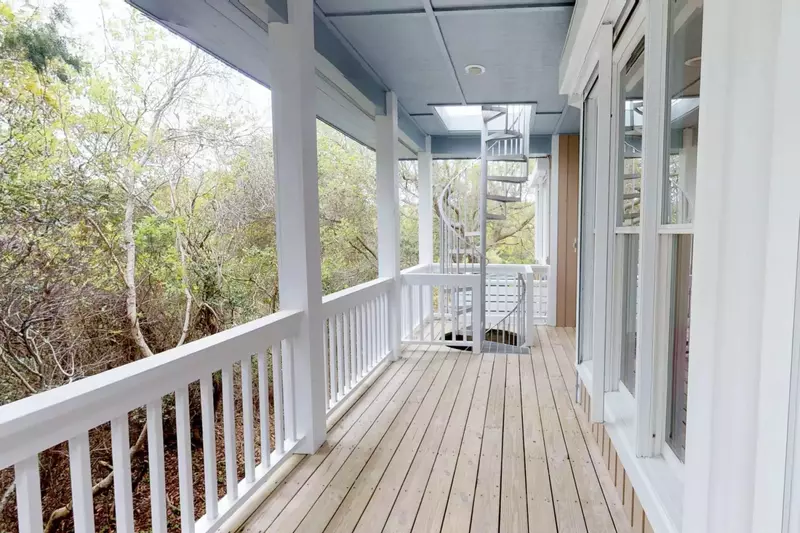 A fun spiral staircase connects the decks