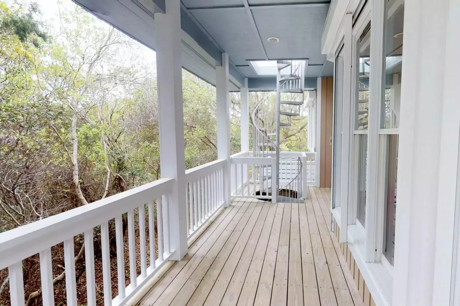 A fun spiral staircase connects the decks