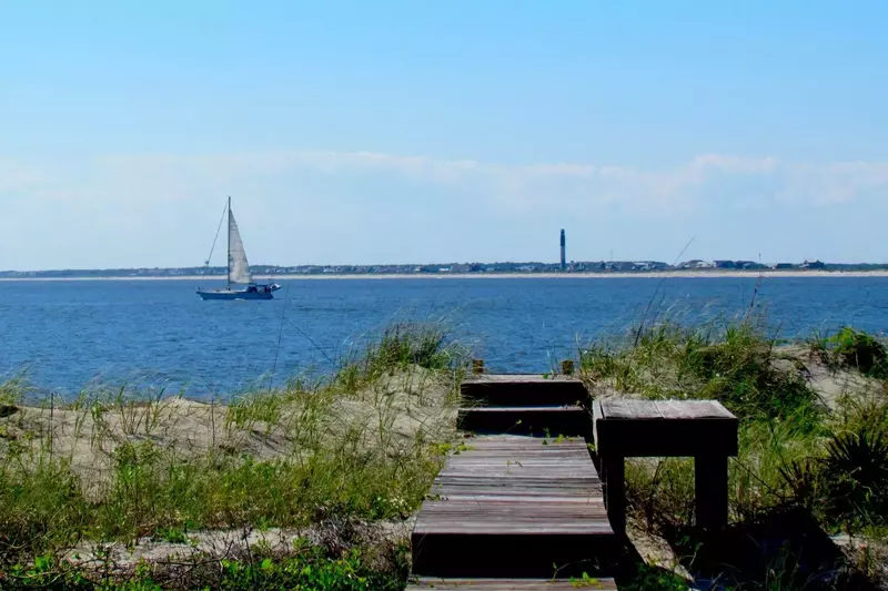 Sail boats, light houses, the beach, dolphins, birds, and 100 steps to the beach, not bad!