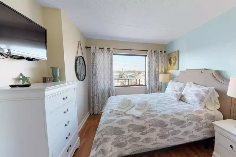 Comfy queen size bed with attached full bath