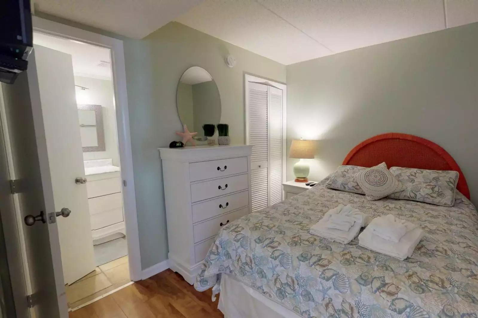 The second bedroom includes a Queen size bed and connected full bathroom