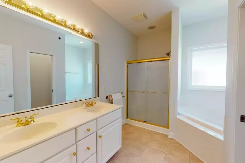 Large full bathroom in owner suite