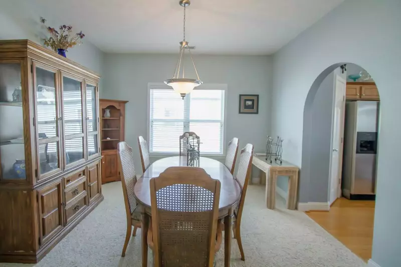 Along with a kitchen table, deck tables, and breakfast bar there is more seating to have a great evening dinner.