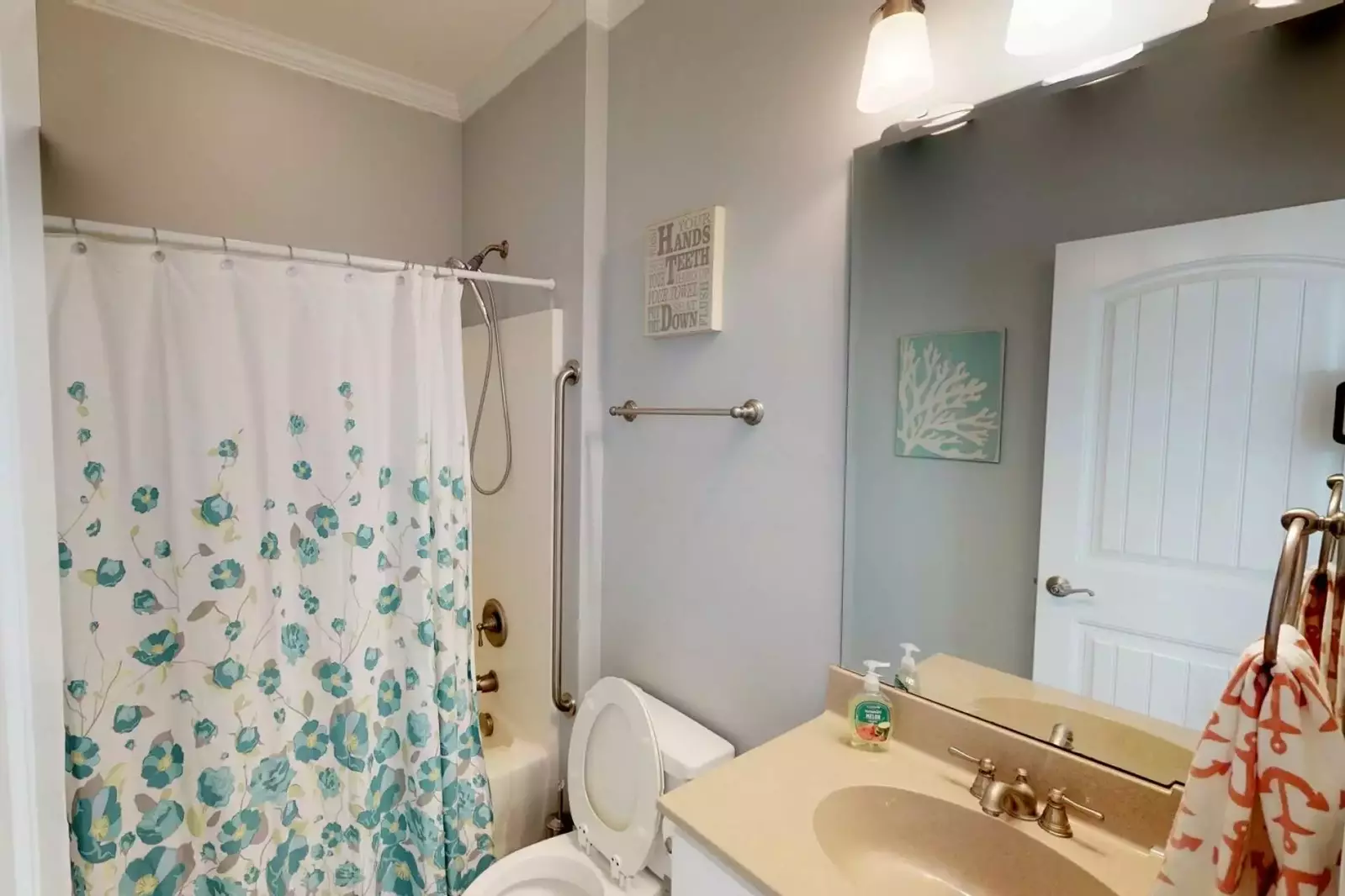 Full bath off main living space and 2nd floor nautical bedroom.