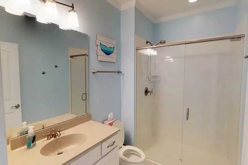 Full bath located on the 1st floor for the bunk room and the 1st floor living space.