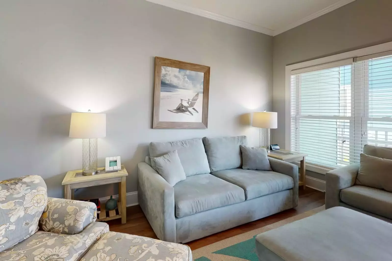 Another living space on the 1st floor with it's own deck and a queen pullout couch.