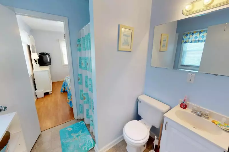 There is a shared bath located between both bedrooms.