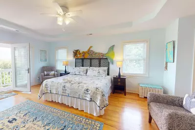 The main master has a custom shell fireplace, access to 2 decks, a private en-suite and a high-end memory foam mattress