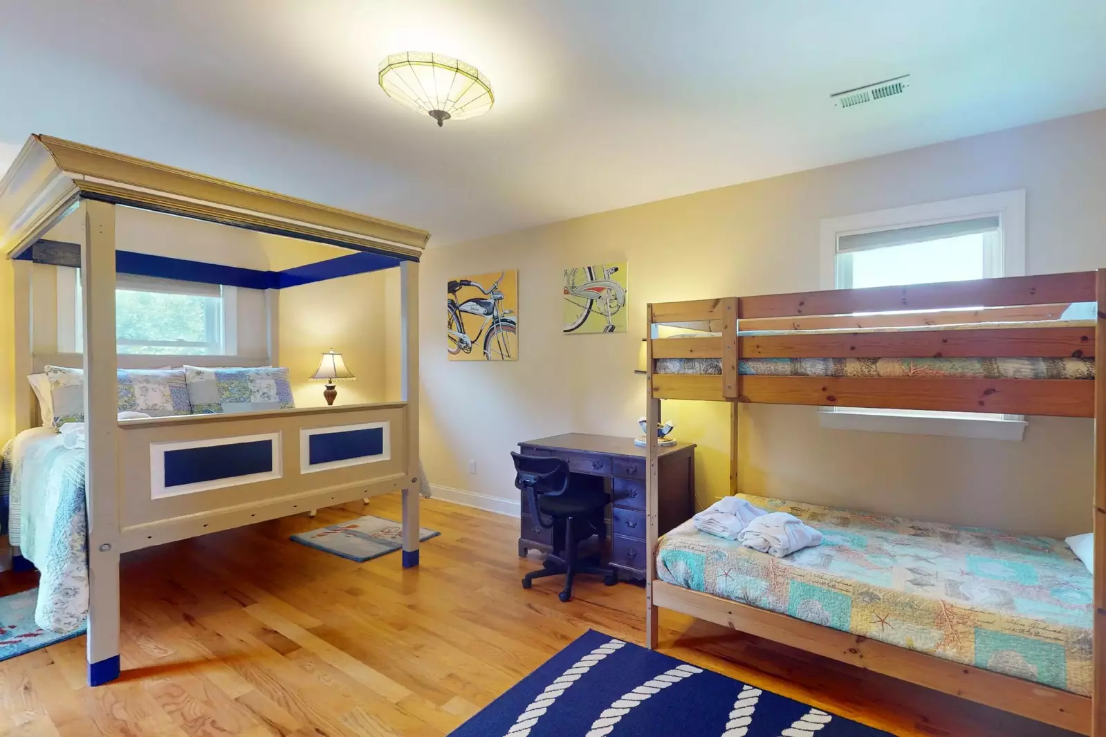 The bunk room is roomy and perfect for the kids or a few young adults. Need do to some work? Just take a seat at the desk.