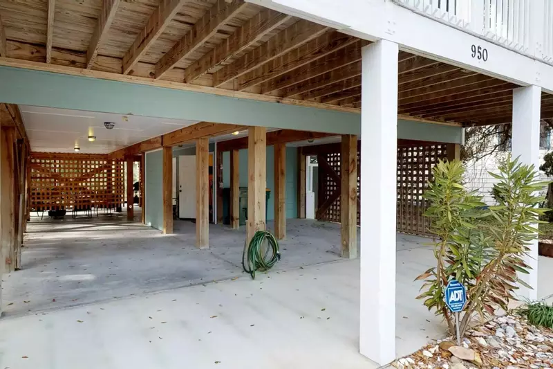Plenty of covered parking a wash down area for rinsing off beach toys and an enclosed roomy outdoor shower on the ground floor