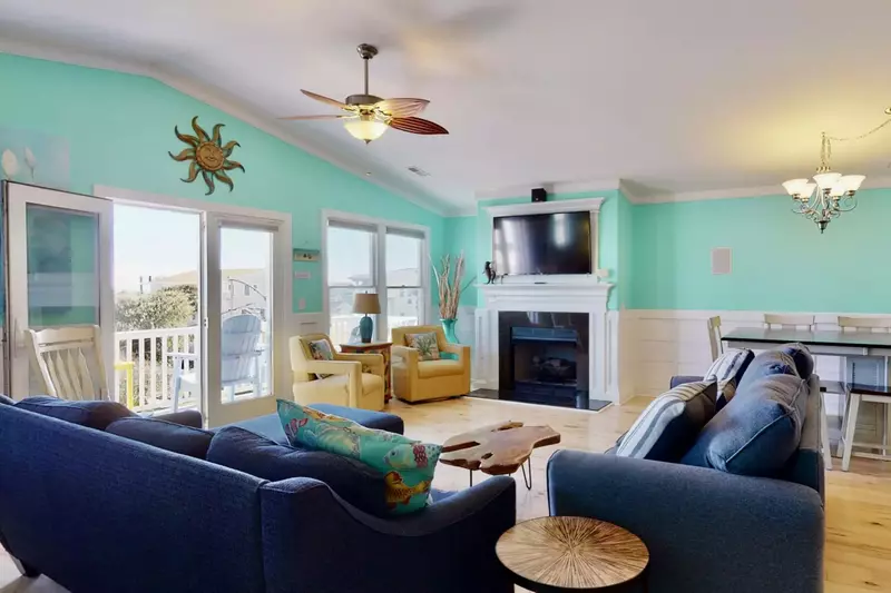 Watch TV with plenty of seating or have a meal at the large dining table