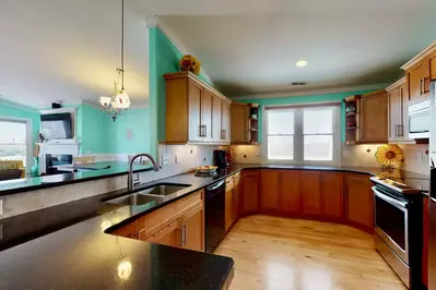 Fully stocked gourmet kitchen with all the tools to make that special dinner for groups large and small.