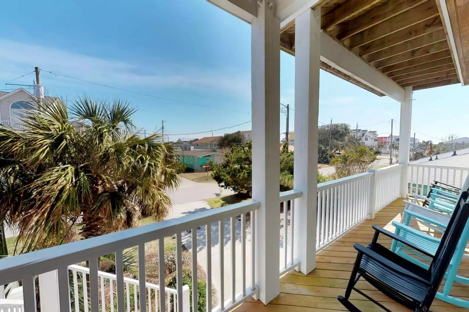 The 1st floor deck is a great place to finish that novel and take in views of the ocean in a rocking chair