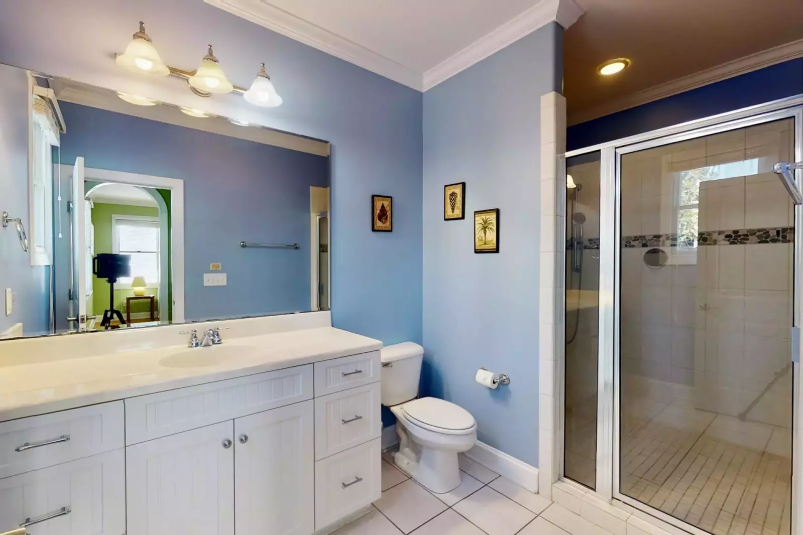 The second Owner Suite bath has a huge walk in shower.