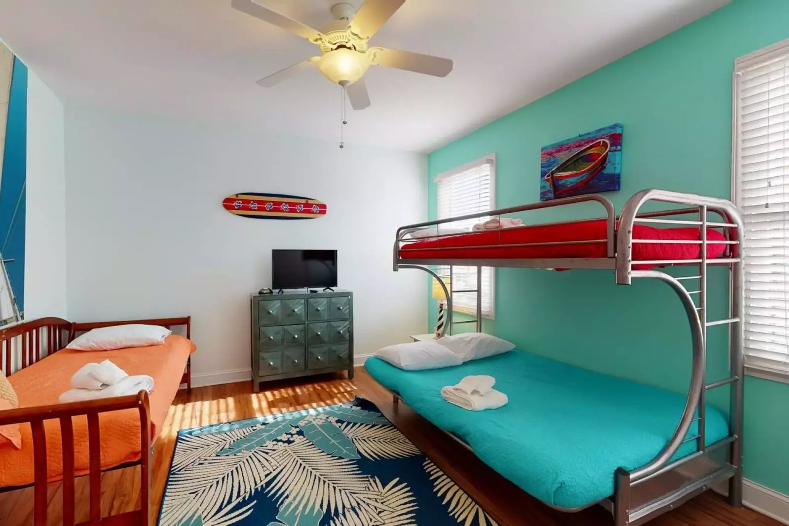 The kids room has a full/twin bunk and a day bed with a smart TV