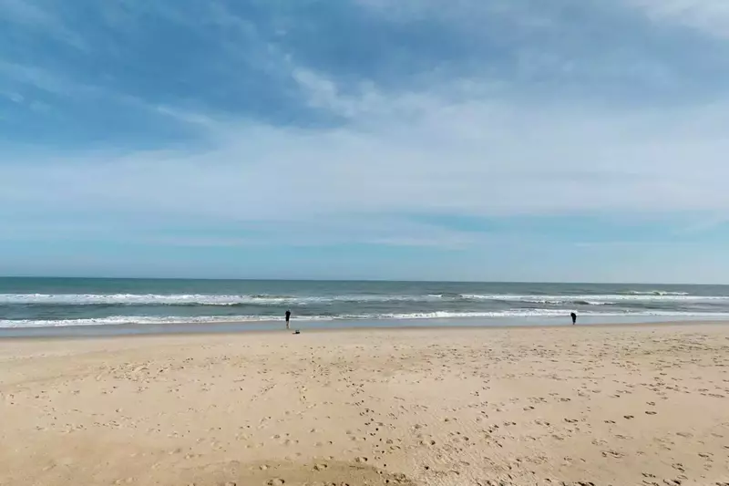 You and the crew will have plenty space to have fun on the family friendly sands of Kure Beach