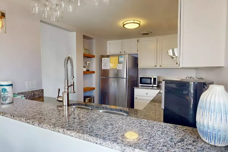 The kitchen is conveniently open to the living area