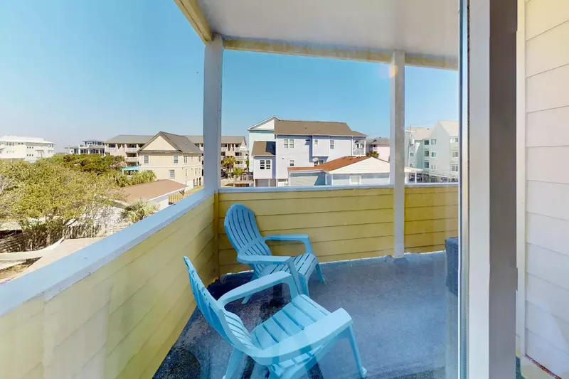 The back deck is another great place to relax, and the bin has beach chairs, toys, and more!