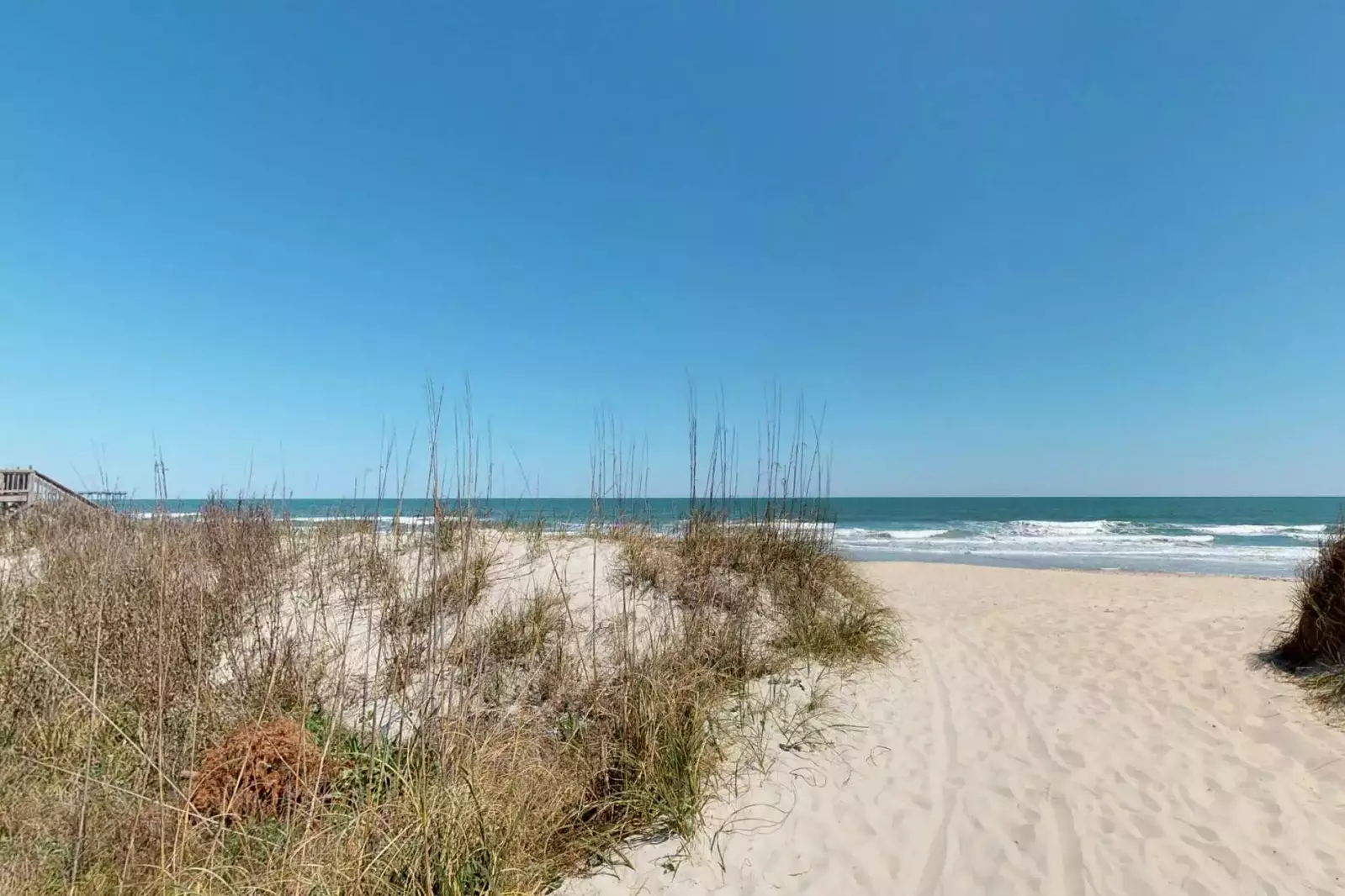 Very short walk to a great beach access, feel the sand in between your toes!