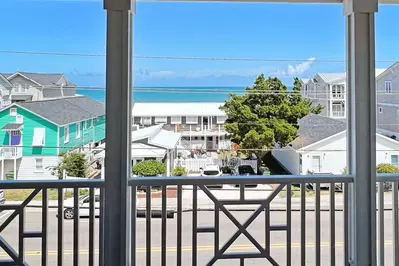 The spacious top floor deck provides an ocean view